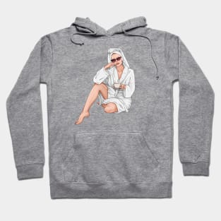 Beautiful woman with cup of tea in white spa robe Hoodie